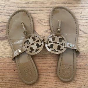 Sand colored patent leather Tory Burch sandals